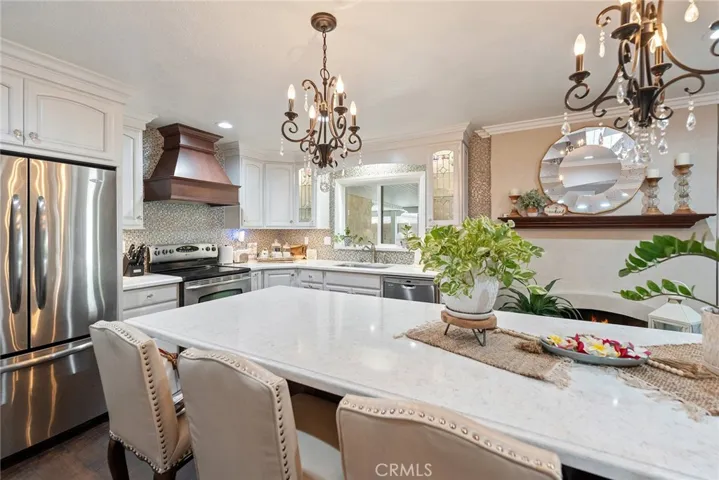 Ten foot quartz island perfect for prepping, gathering, and entertaining