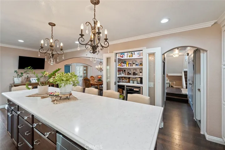 Large walk in pantry with glass double doors