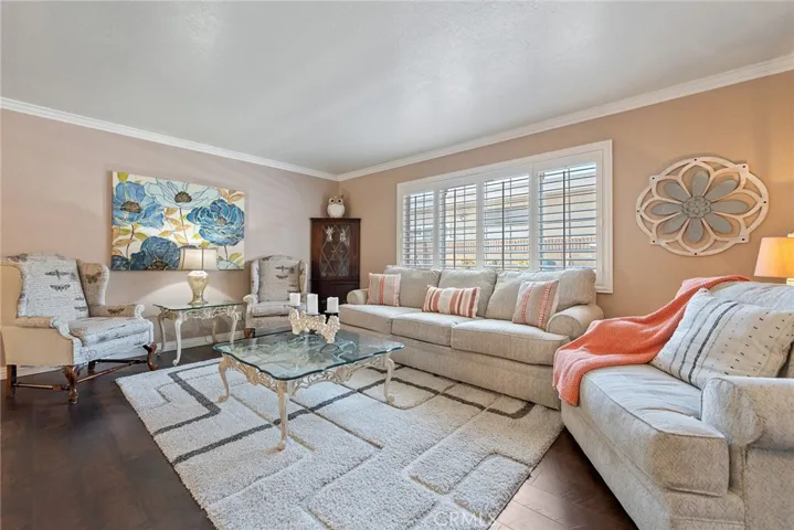 Step down into a light filled living room.