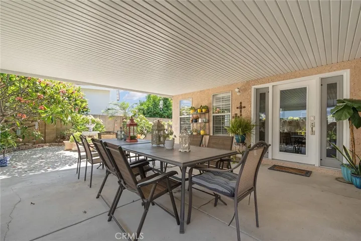 Oversized aluminum patio cover offering shady comfort to entertain in
