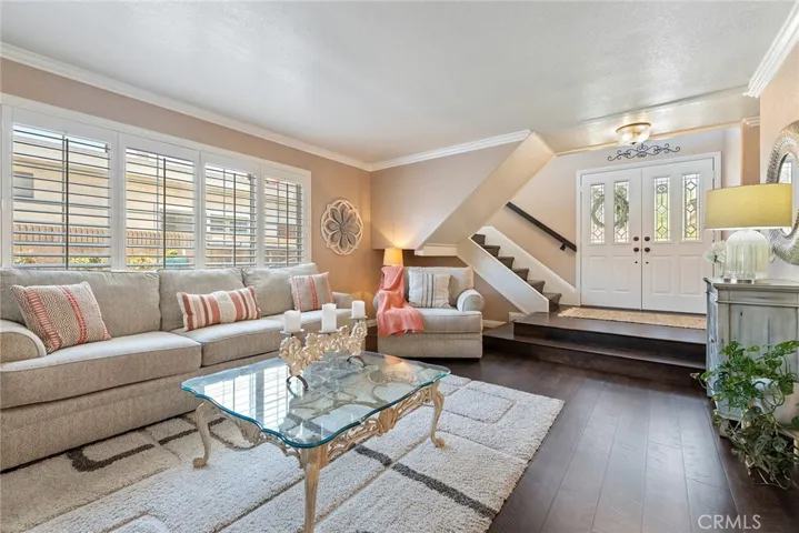 Stairwell leads to second floor with four additional bedrooms