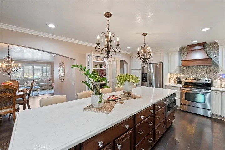 Custom cabinetry with soft close drawers, designer drawer pulls, and microwave drawer