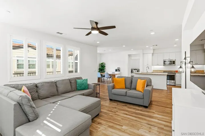 Living room, looking into kitchen and dining room
