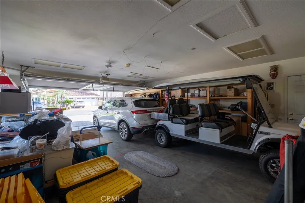 Please view the garage it is deep and has a full custom garage screen.