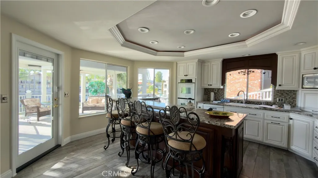 Open kitchen faces the lake for breathtaking views.