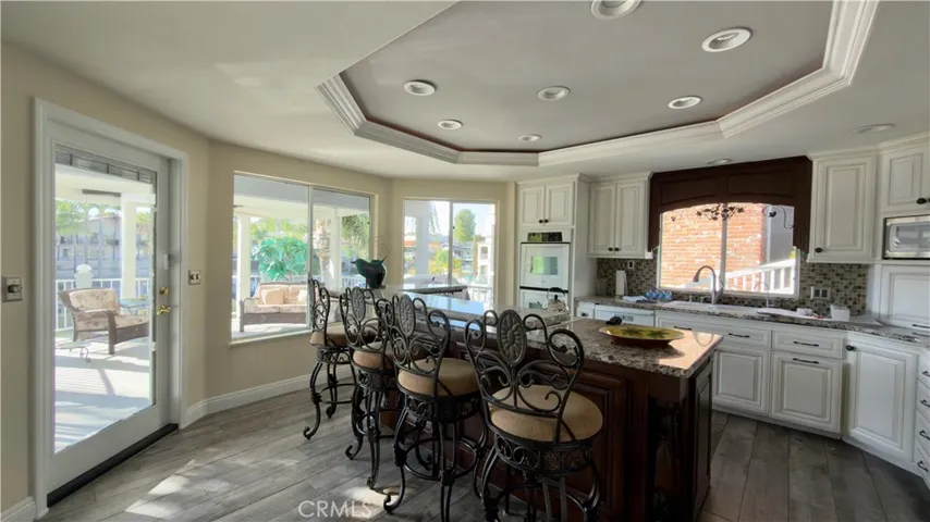 Open kitchen faces the lake for breathtaking views.