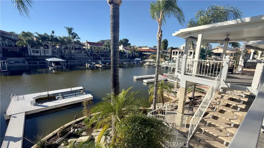 View of the dock, with boat lift. Choose which deck to entertain on or use them all