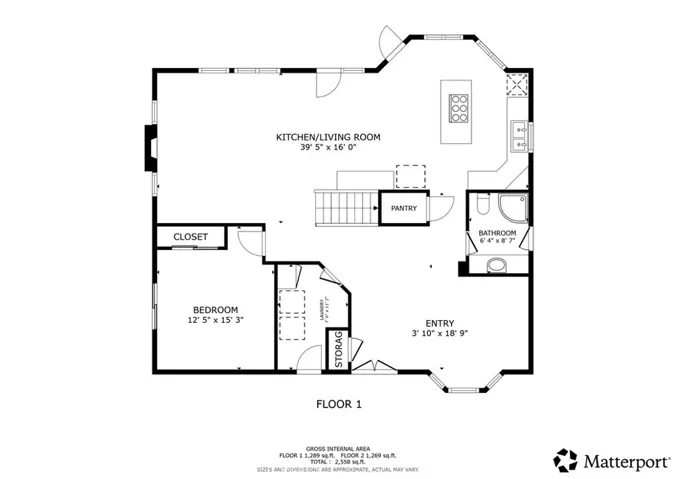 Floor Plan downstairs, the kitchen/living room has windows and doors overlooking the water. Bedroom has it's own sliding door entry. The bathroom has an entry from the outside for easy access from a day on the water to shower and put the clothes in the laundry room.