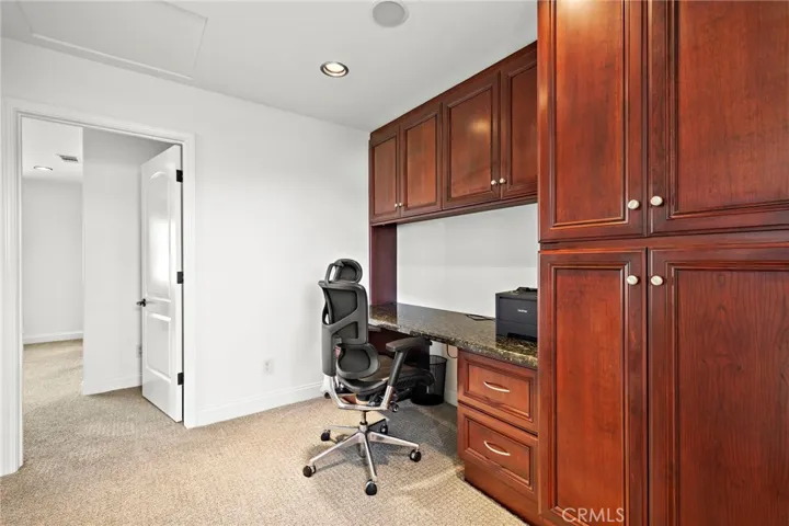 Office area at top of second staircase.