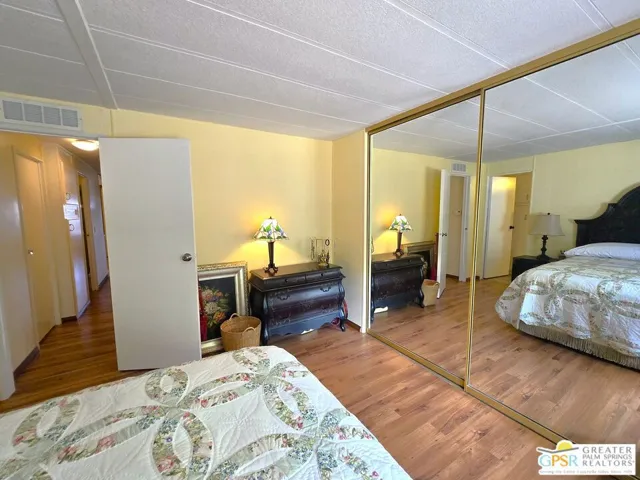 Wall Sized Closet With Mirrore