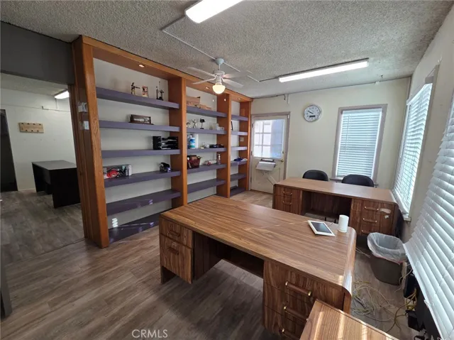 Built-in shelving in front office.