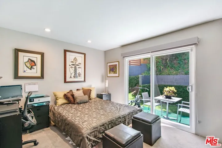 Second bedroom segues to a pri