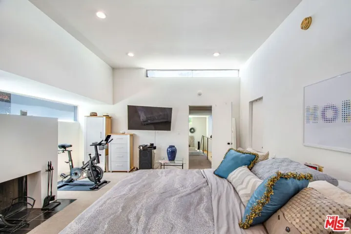 Large primary bedroom with fir