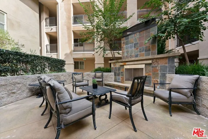 Cozy Courtyard Fireplace