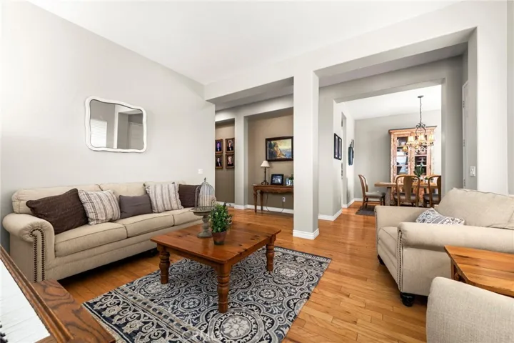 Formal living room showing dining room