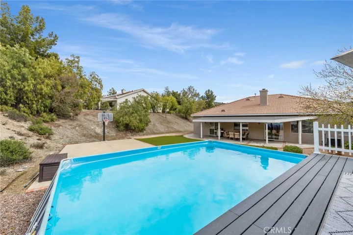 Above ground pool with sports court