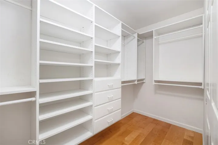 One of two Walk In Closets for Master B.