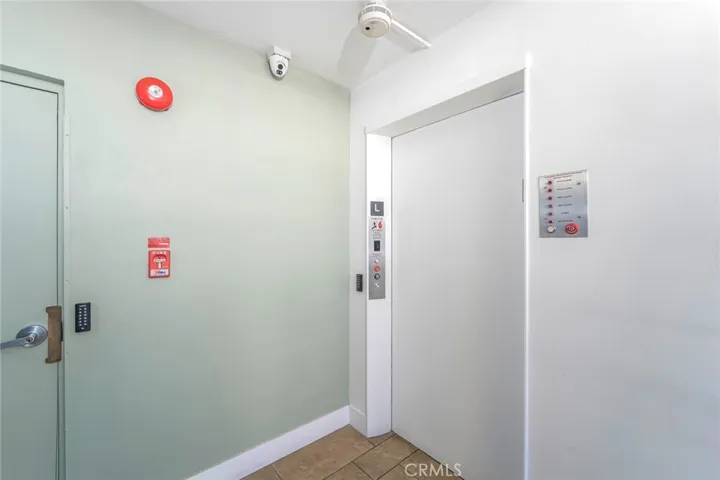 One of many security cameras throughout the building along with fob access to elevator.