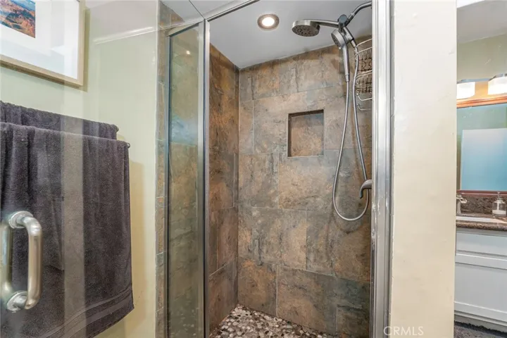 Remodeled Primary Shower with Stone Flooring
