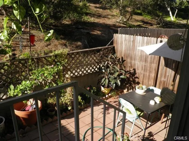 Your own patio yard area under the tall pines.