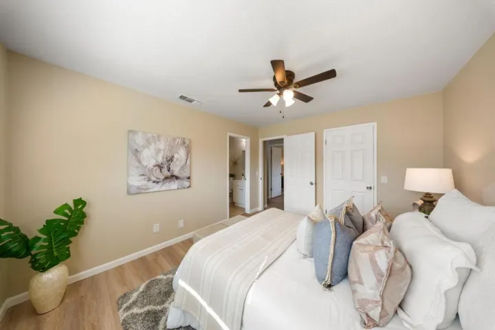 Primary Suite. Neutral and natural colored walls and flooring.