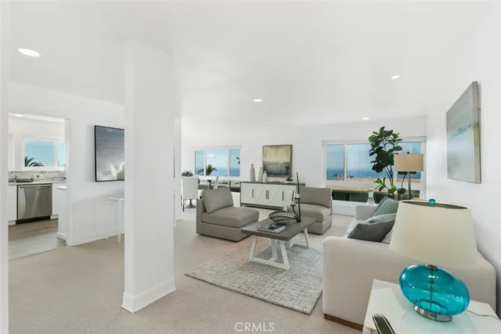 View toward living and kitchen areas from entry (prior staging photos)