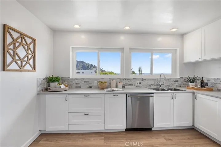 Beautiful ocean and south facing hills views from this lovely kitchen