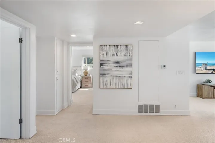 View facing primary bedroom suite
