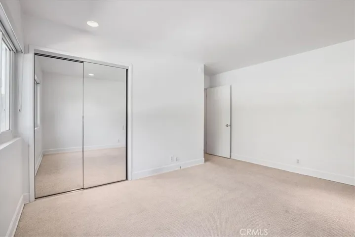 View of same room without furniture