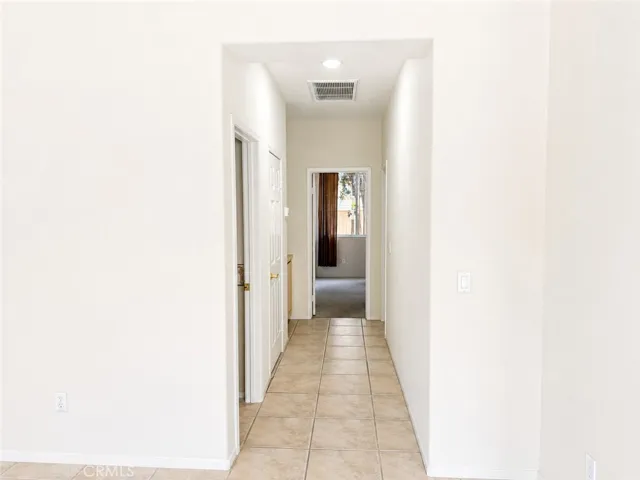 Hallway to the 2nd bedroom and the laundry room