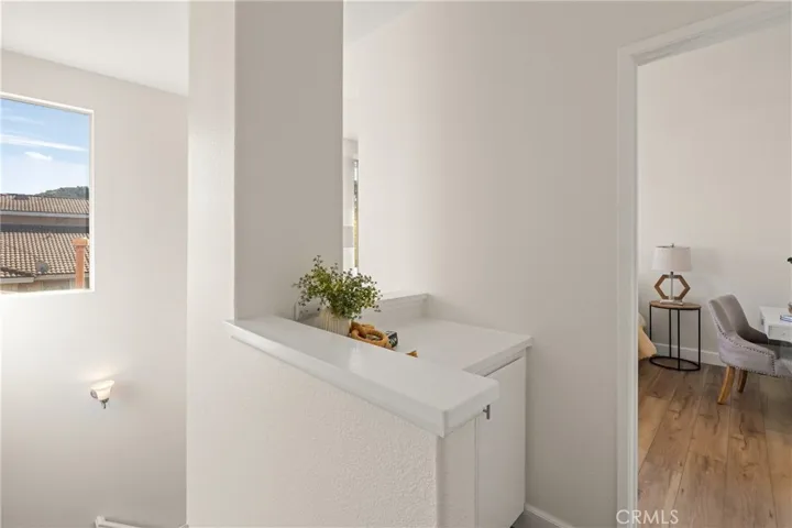 Upstairs hallway aand linen closet, lots of natural light