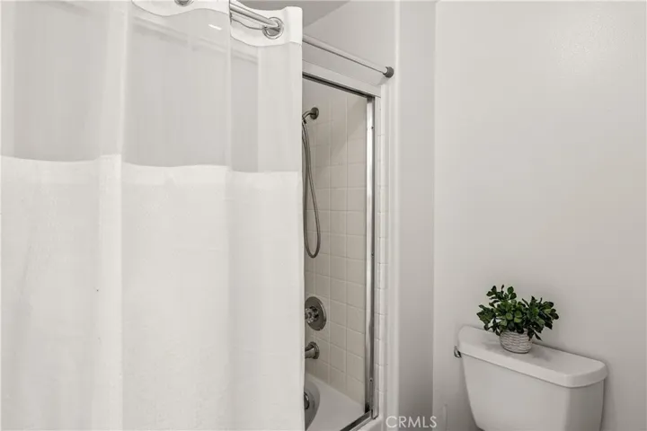 Bathroom with tub & shower ombo