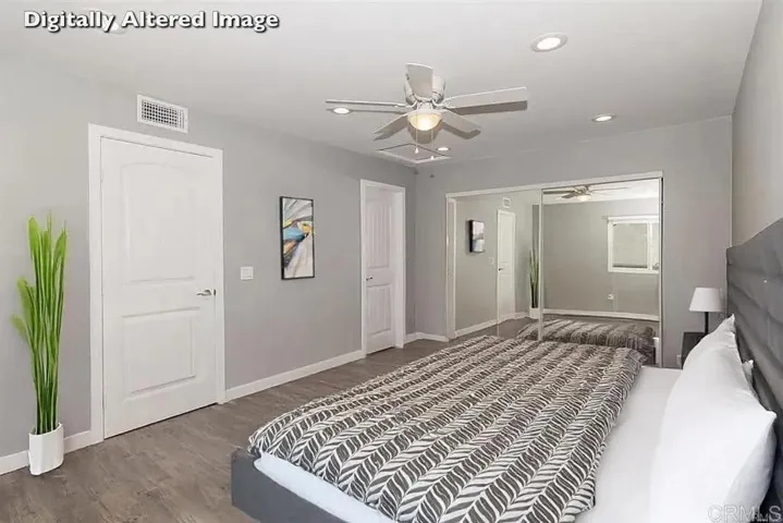 Primary bedroom with ensuite bathroom (behind the rear door pictured here)