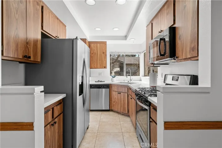 Kitchen with new Quartz countertops open to Dining Room
