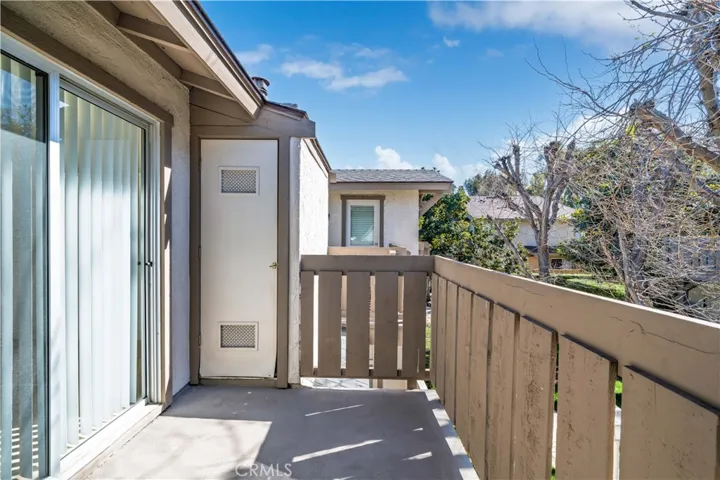 Second Deck with door to Kitchen and sliders to Front Bedroom