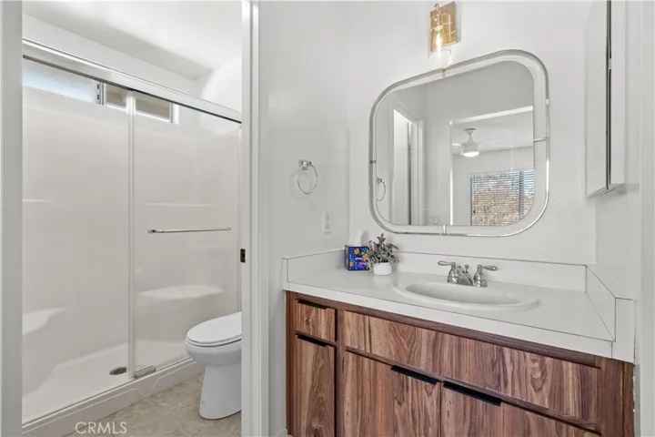 Primary ensuite Bathroom with privacy door and walk-in shower
