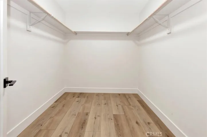 One of three walk-in closets in the primary suite.