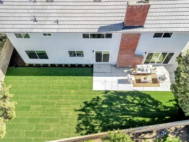 The exterior is equally impressive with a new Eagle tile roof, refreshed stucco and paint, updated garage door and opener, new concrete patio, lush new sod, automated sprinkler system, and enhanced landscaping.
