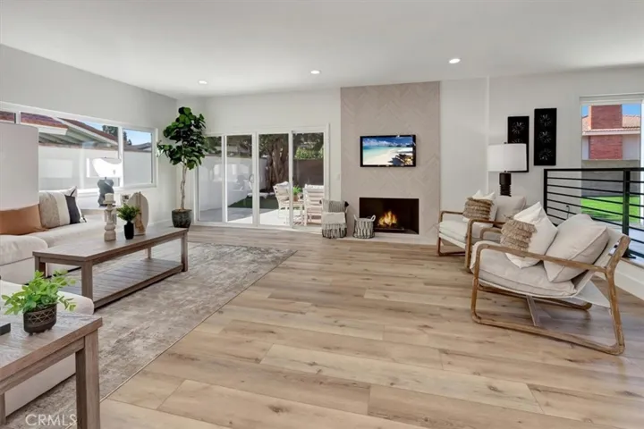 Throughout the home you’ll find wide-plank waterproof luxury vinyl flooring, tall baseboards, new interior paint, retextured ceilings, recessed LED lighting, updated doors and hardware, and a fully upgraded Leviton media and networking system.