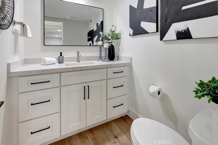 Powder room remodeled with timeless finishes and quality craftsmanship.