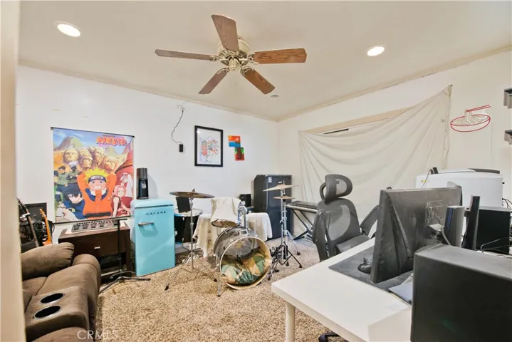 guest bedroom with private patio and sliding glass door