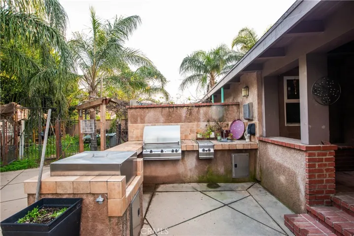 Backyard BBQ entertainment area
