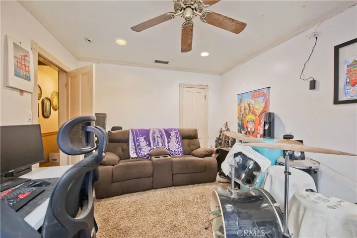 guest bedroom with private patio and sliding glass door
