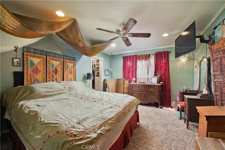Primary with walk-in closet and attached bathroom