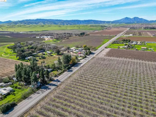 View of rural area with large plots for crops