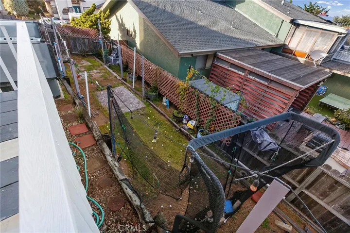 Side yard currently set up as a driving range