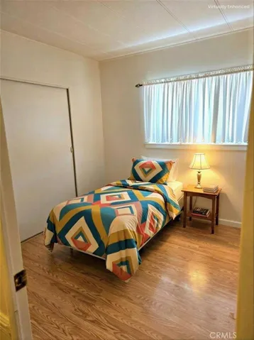Front bedroom. Image has been digitally staged.