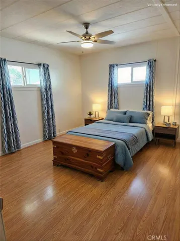 Primary bedroom. Image has been digitally staged.