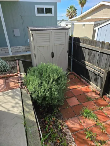 Rubbermaid shed, included.