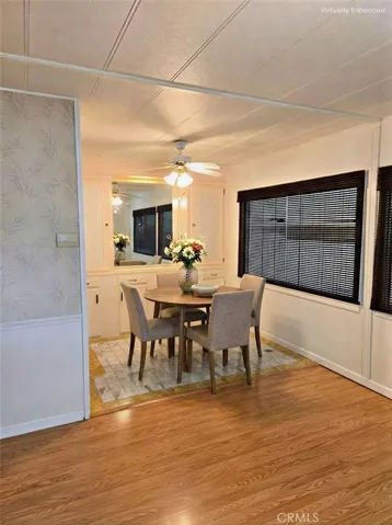 Dining room. Image has been digitally staged.